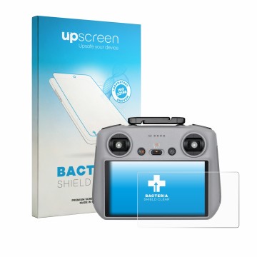 Face avant d’un emballage produit avec le logo de la marque upscreen. À côté, l’appareil DJI RC 2 2025 est représenté avec la 