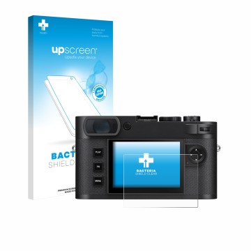 Parte frontal de un envase de producto con el logotipo de la marca upscreen. Al lado se muestra el dispositivo Leica M EV1 con