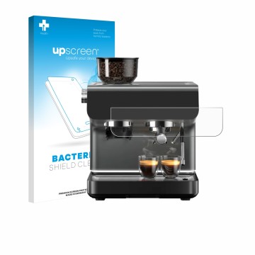 Face avant d’un emballage produit avec le logo de la marque upscreen. À côté, l’appareil WMF Espresso Pro est représenté avec 