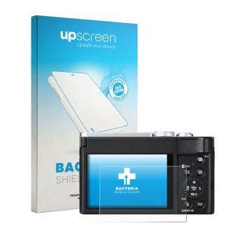 Face avant d’un emballage produit avec le logo de la marque upscreen. À côté, l’appareil Panasonic Lumix DC-TZ99E-S est représ